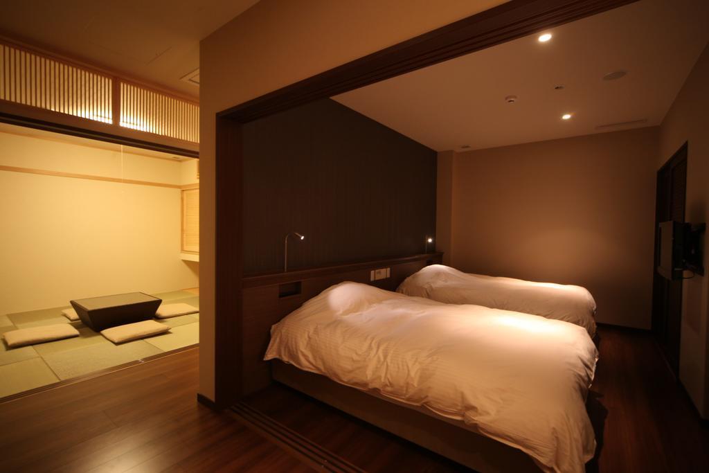 Amane Resort Seikai Beppu Bagian luar foto A room at the Ryokan Hotel