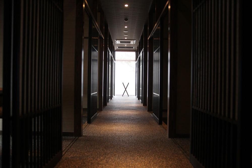 Amane Resort Seikai Beppu Bagian luar foto A corridor in a hotel