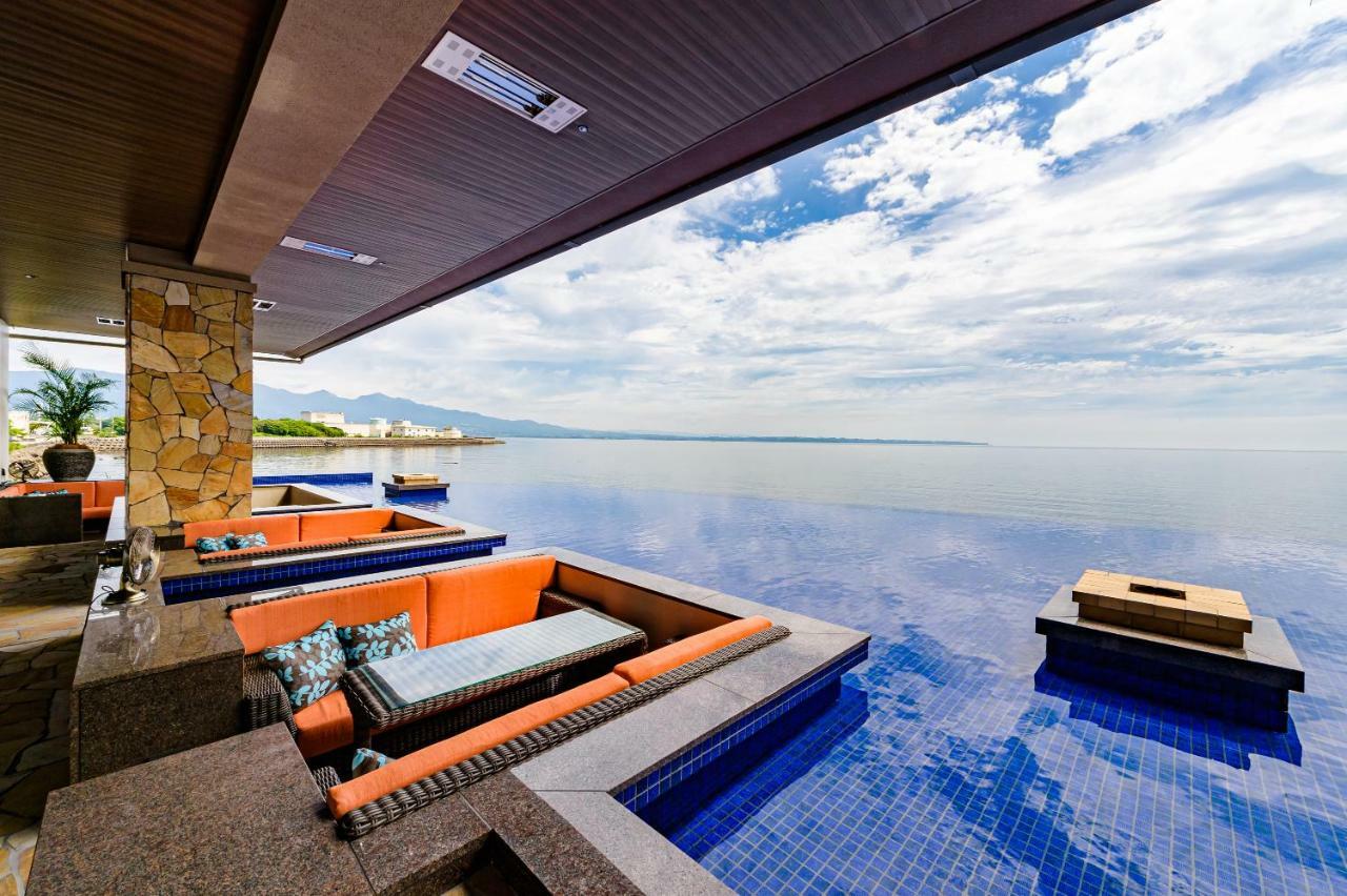 Amane Resort Seikai Beppu Bagian luar foto Infinity pool at the hotel